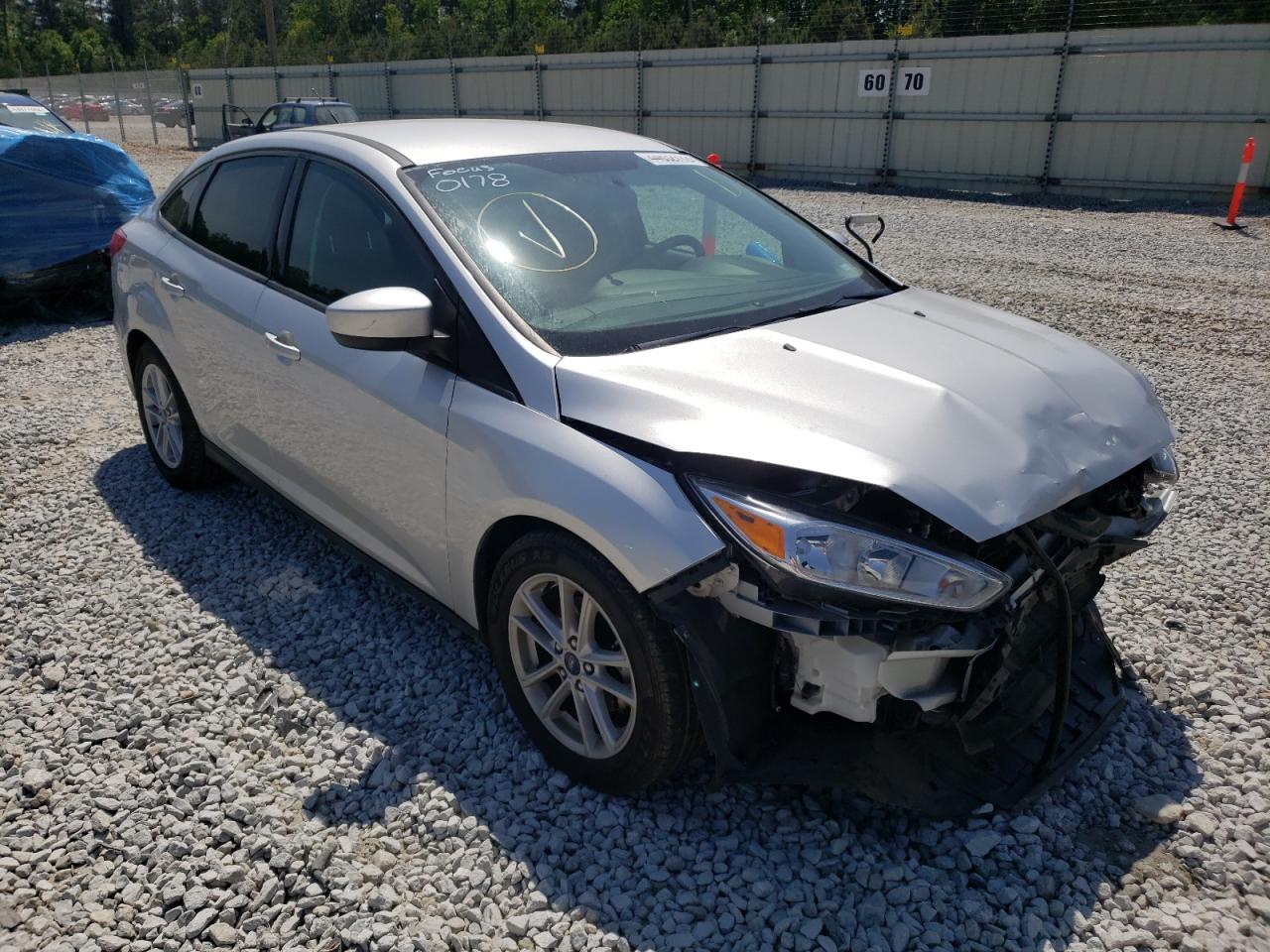 FORD FOCUS SE 2018 with VIN 1FADP3F26JL280178 - Photo from auction