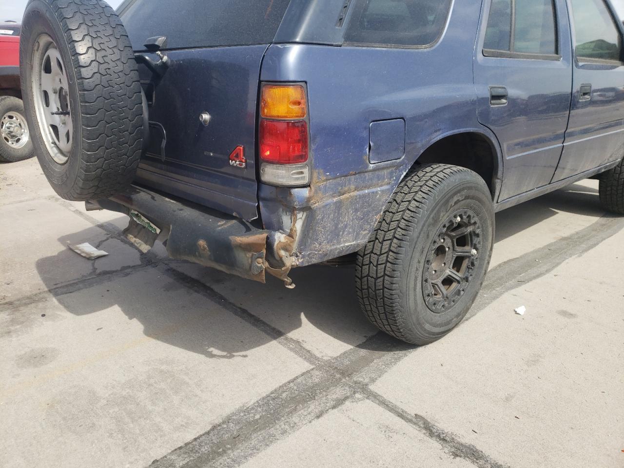Photo 9 from auction – 1997 ISUZU RODEO S with VIN 4S2CM58VXV4304441