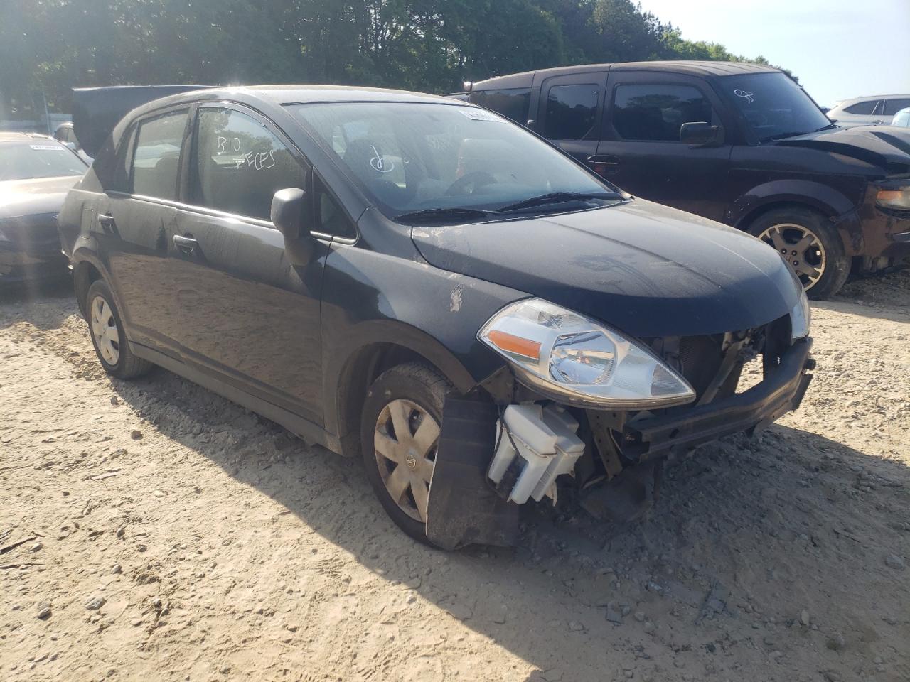 Photo 12 from auction – 2011 NISSAN VERSA S with VIN 3N1CC1APXBL390989
