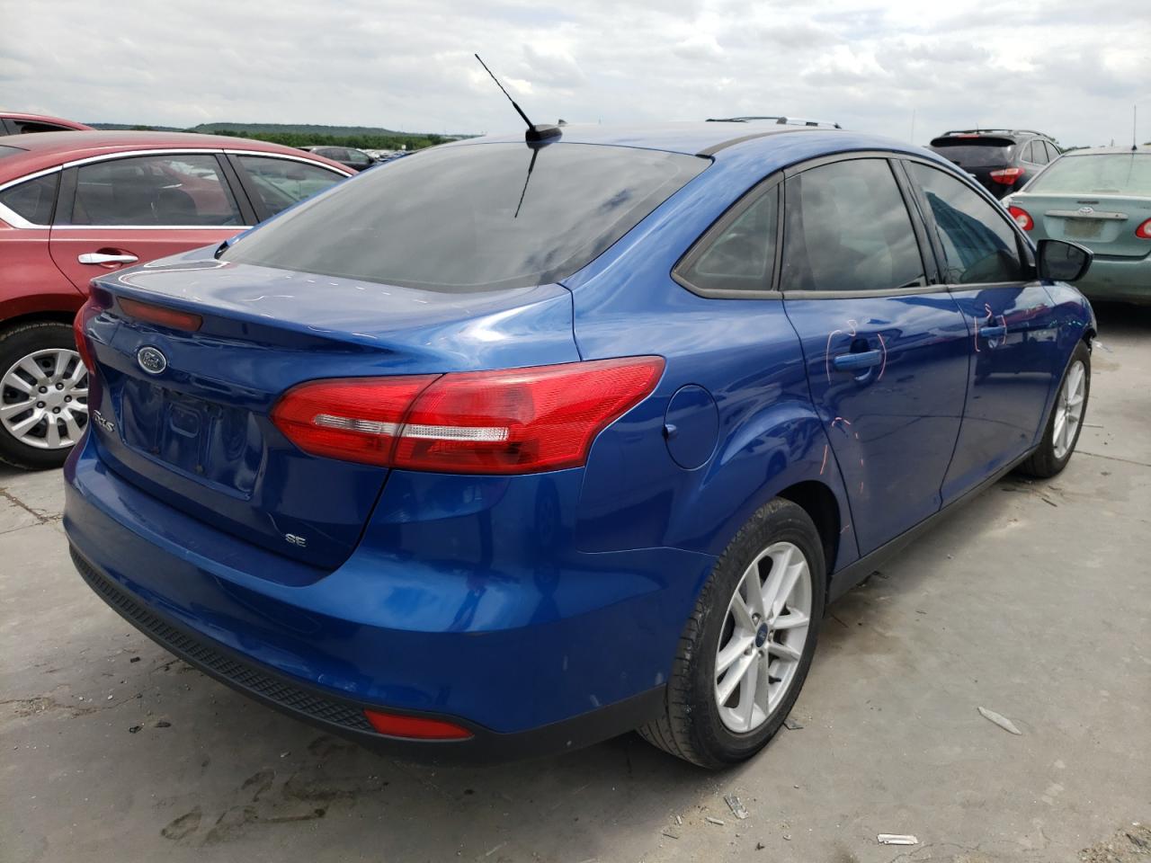 Photo 4 from auction – 2018 FORD FOCUS SE with VIN 1FADP3F2XJL250424