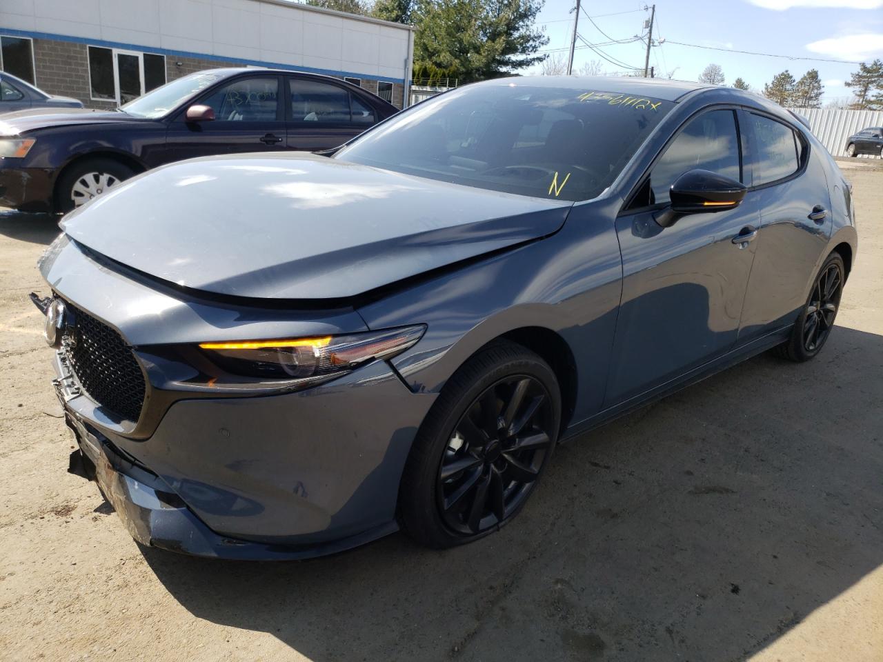 Photo 2 from auction – 2021 MAZDA 3 PREMIUM with VIN JM1BPBNY9M1400136
