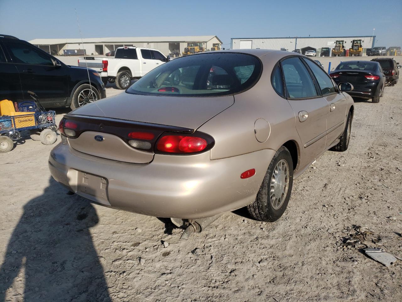 Photo 4 from auction – 1999 FORD TAURUS SE with VIN 1FAFP53S0XA101470