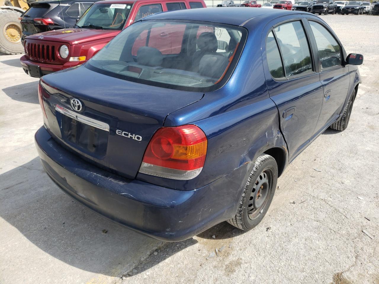 Photo 4 from auction – 2003 TOYOTA ECHO with VIN JTDBT123130294252