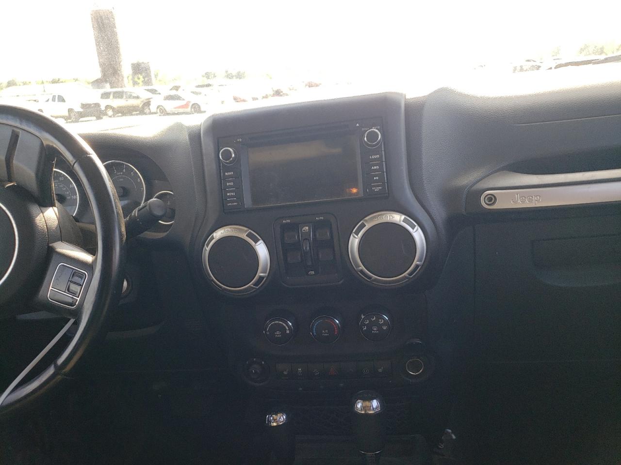 Photo 9 from auction – 2011 JEEP WRANGLER U with VIN 1J4BA5H18BL572672