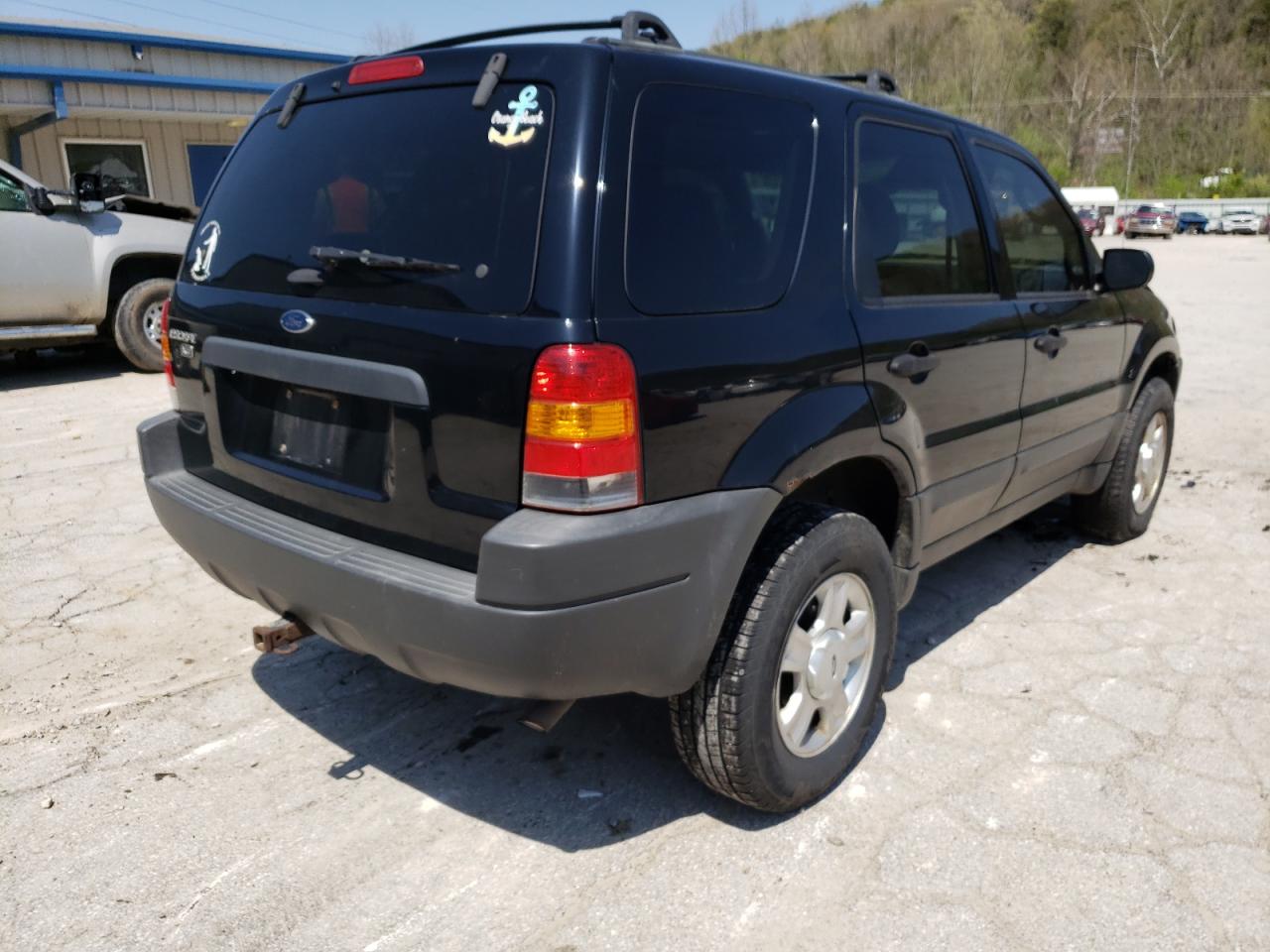 Photo 4 from auction – 2003 FORD ESCAPE XLT with VIN 1FMYU93163KD75279