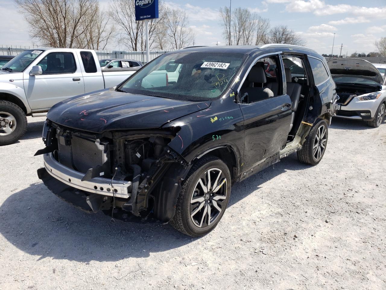 Photo 2 from auction – 2019 HONDA PILOT ELIT with VIN 5FNYF6H0XKB051924