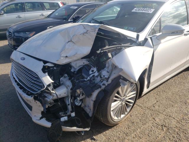 Photo 9 from auction – 2015 FORD FUSION SE with VIN 3FA6P0HD5FR202571