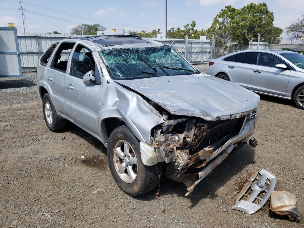 MAZDA TRIBUTE S 2005 with VIN 4F2YZ04165KM60853 - Photo from auction