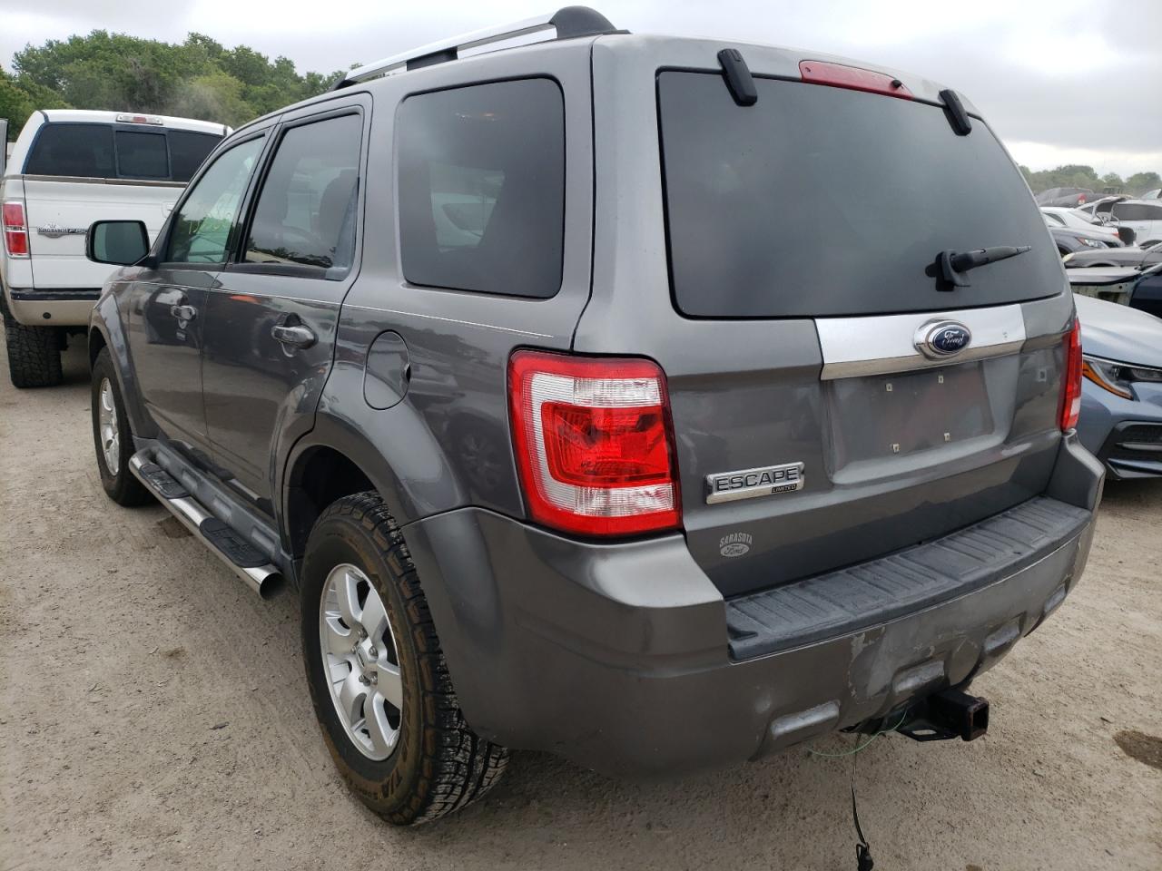 Photo 3 from auction – 2009 FORD ESCAPE LIM with VIN 1FMCU04G89KB88952