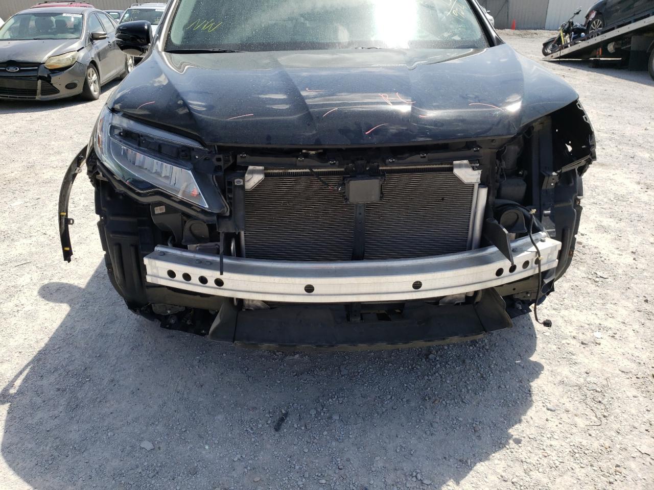 Photo 10 from auction – 2019 HONDA PILOT ELIT with VIN 5FNYF6H0XKB051924