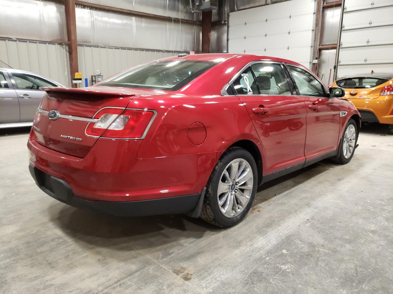 Photo 4 from auction – 2010 FORD TAURUS LIM with VIN 1FAHP2JW4AG129824