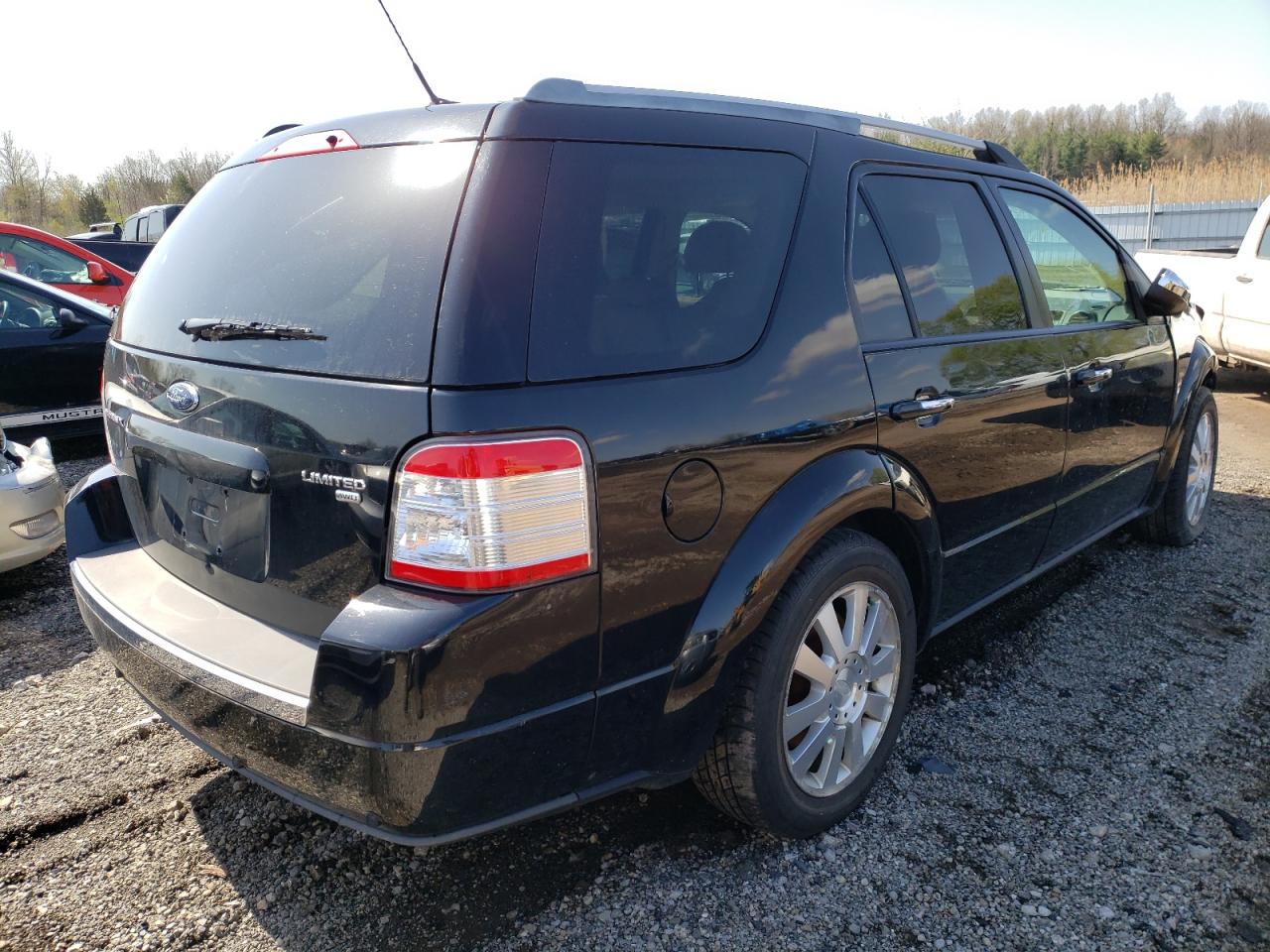 Photo 4 from auction – 2008 FORD TAURUS X L with VIN 1FMDK06W18GA11367