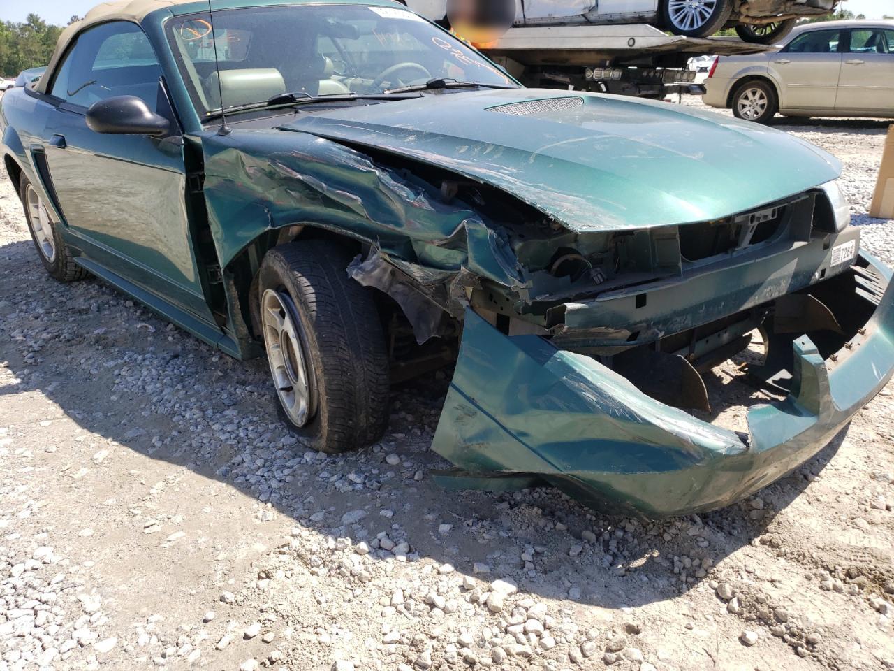Photo 9 from auction – 2000 FORD MUSTANG with VIN 1FAFP4442YF305055