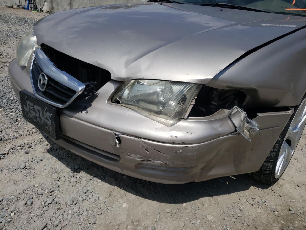 Photo 9 from auction – 2002 MAZDA 626 LX with VIN 1YVGF22C125263291