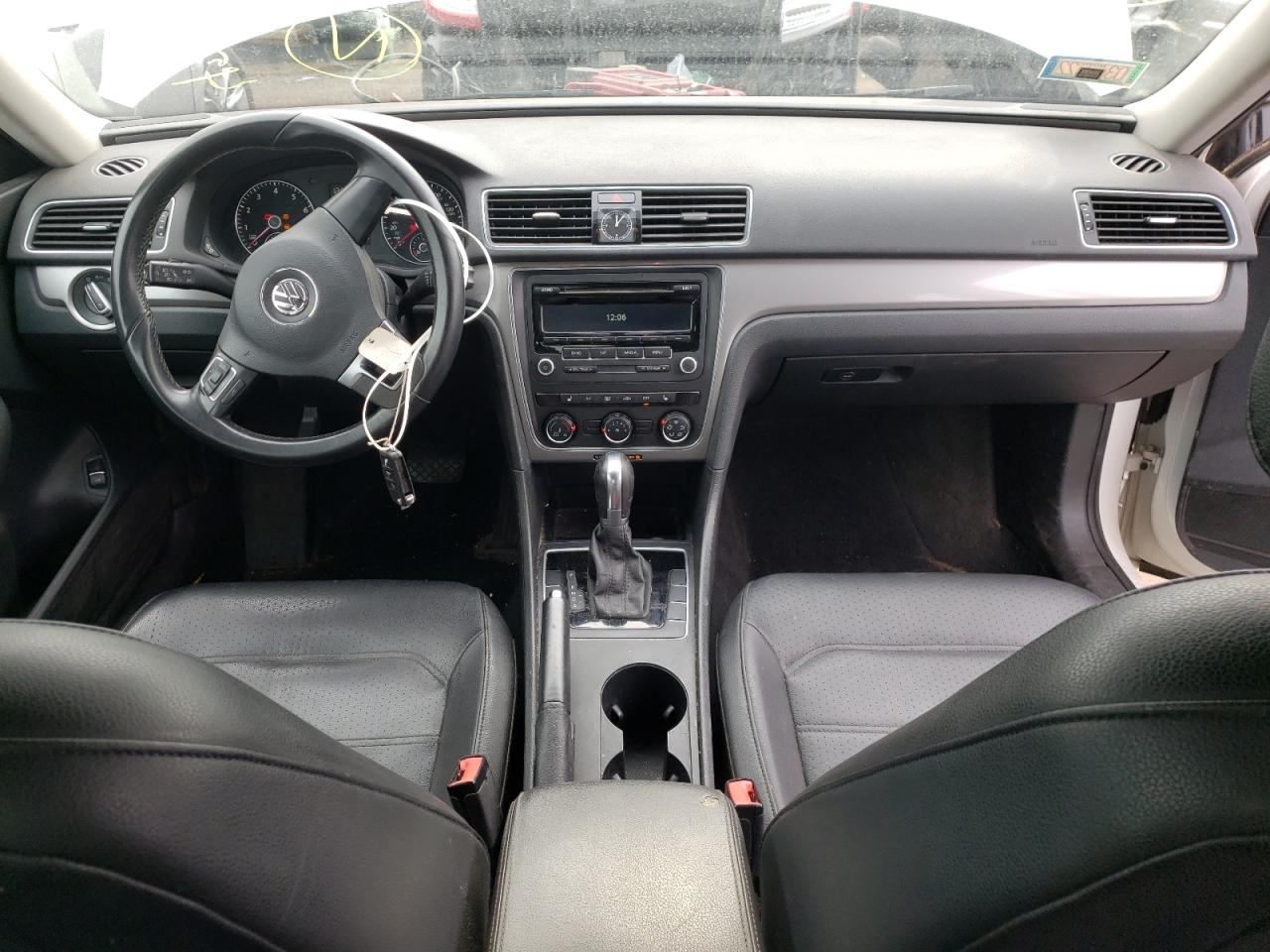 Photo 9 from auction – 2014 VOLKSWAGEN PASSAT S with VIN 1VWAT7A35EC059058