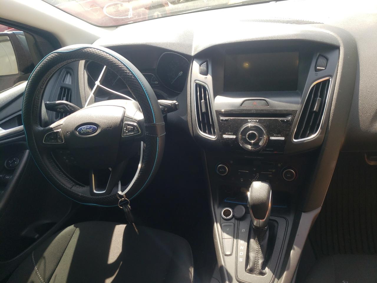 Photo 9 from auction – 2018 FORD FOCUS SEL with VIN 1FADP3M22JL223737