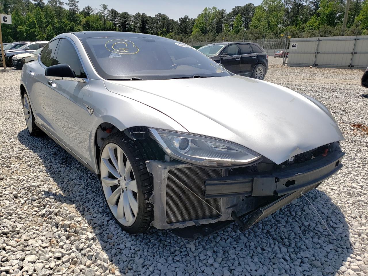 TESLA MODEL S 2013 with VIN 5YJSA1DN2DFP07402 - Photo from auction