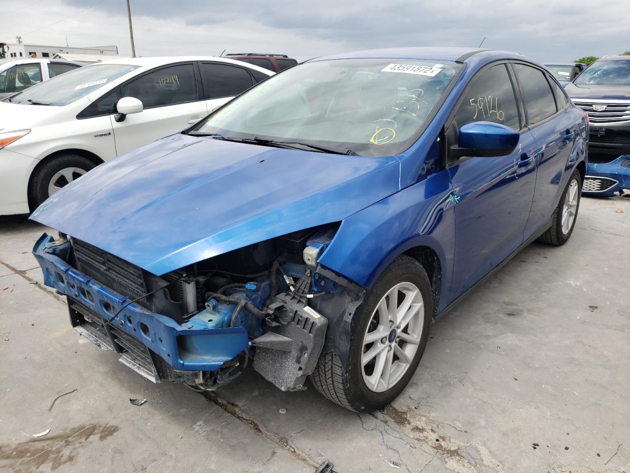 Photo 2 from auction – 2018 FORD FOCUS SE with VIN 1FADP3F2XJL250424