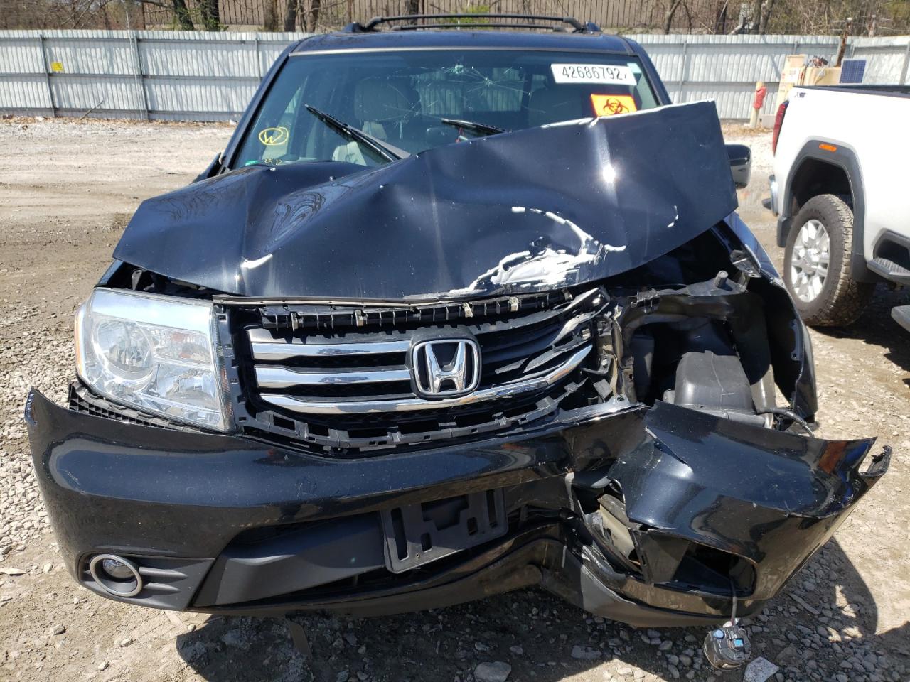 Photo 12 from auction – 2014 HONDA PILOT EXL with VIN 5FNYF4H63EB040051