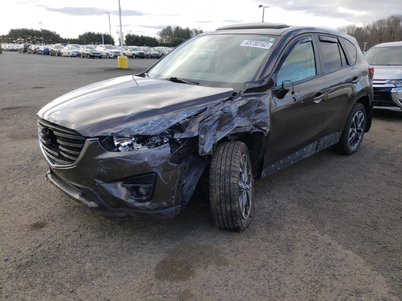 Photo 2 from auction – 2016 MAZDA CX-5 GT with VIN JM3KE4DY5G0629658