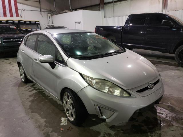 FORD FIESTA SES 2011 with VIN 3FADP4FJ0BM106362 - Photo from auction