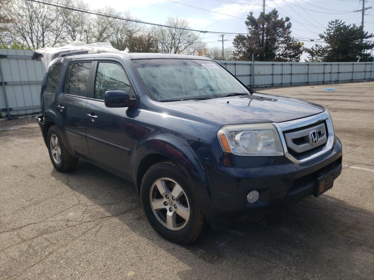 HONDA PILOT EXL 2011 with VIN 5FNYF4H67BB075882 - Photo from auction