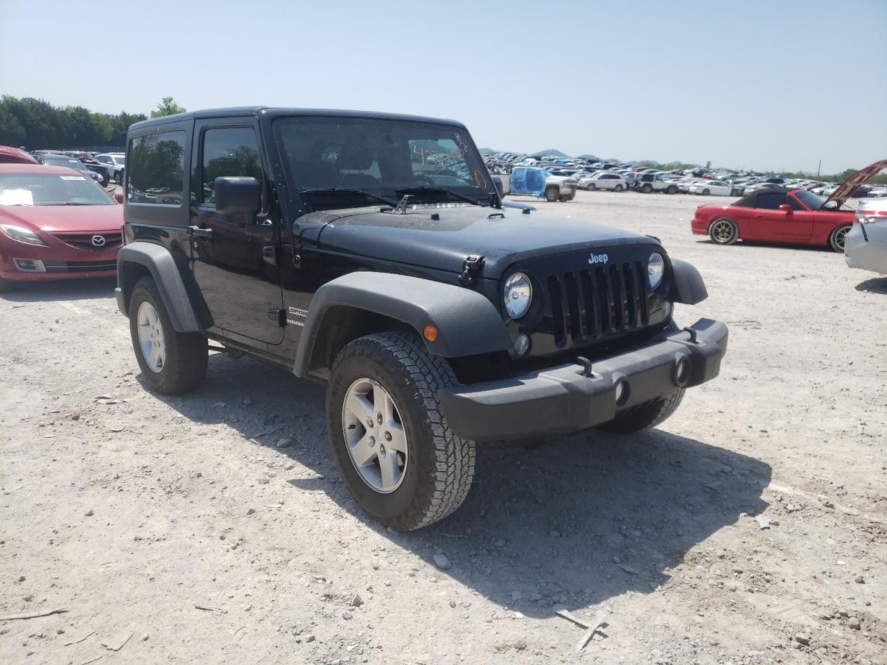JEEP WRANGLER S 2015 with VIN 1C4AJWAG2FL636765 - Photo from auction