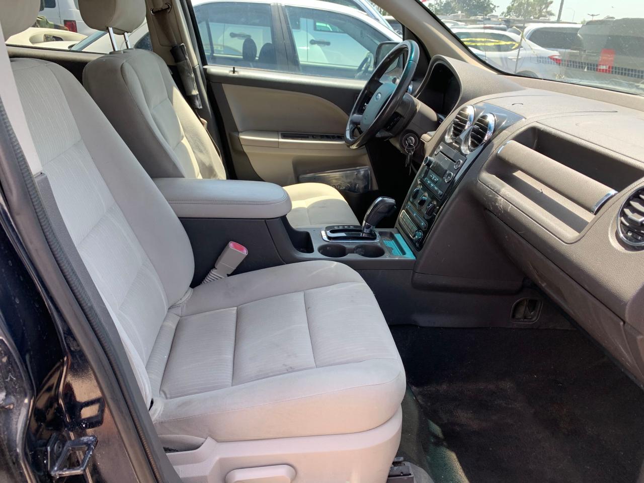 Photo 5 from auction – 2008 FORD TAURUS X S with VIN 1FMDK02W08GA09907