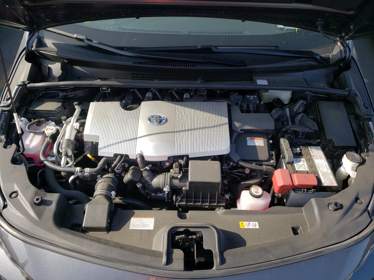 Photo 7 from auction – 2021 TOYOTA PRIUS PRIM with VIN JTDKAMFPXM3176589