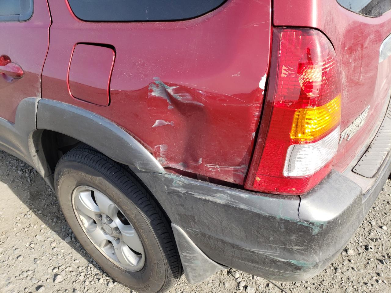 Photo 9 from auction – 2003 MAZDA TRIBUTE ES with VIN 4F2CZ96163KM04811