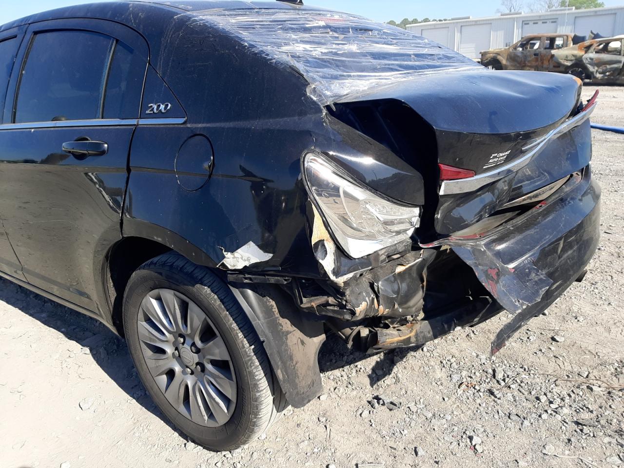 Photo 9 from auction – 2013 CHRYSLER 200 LX with VIN 1C3CCBABXDN561156