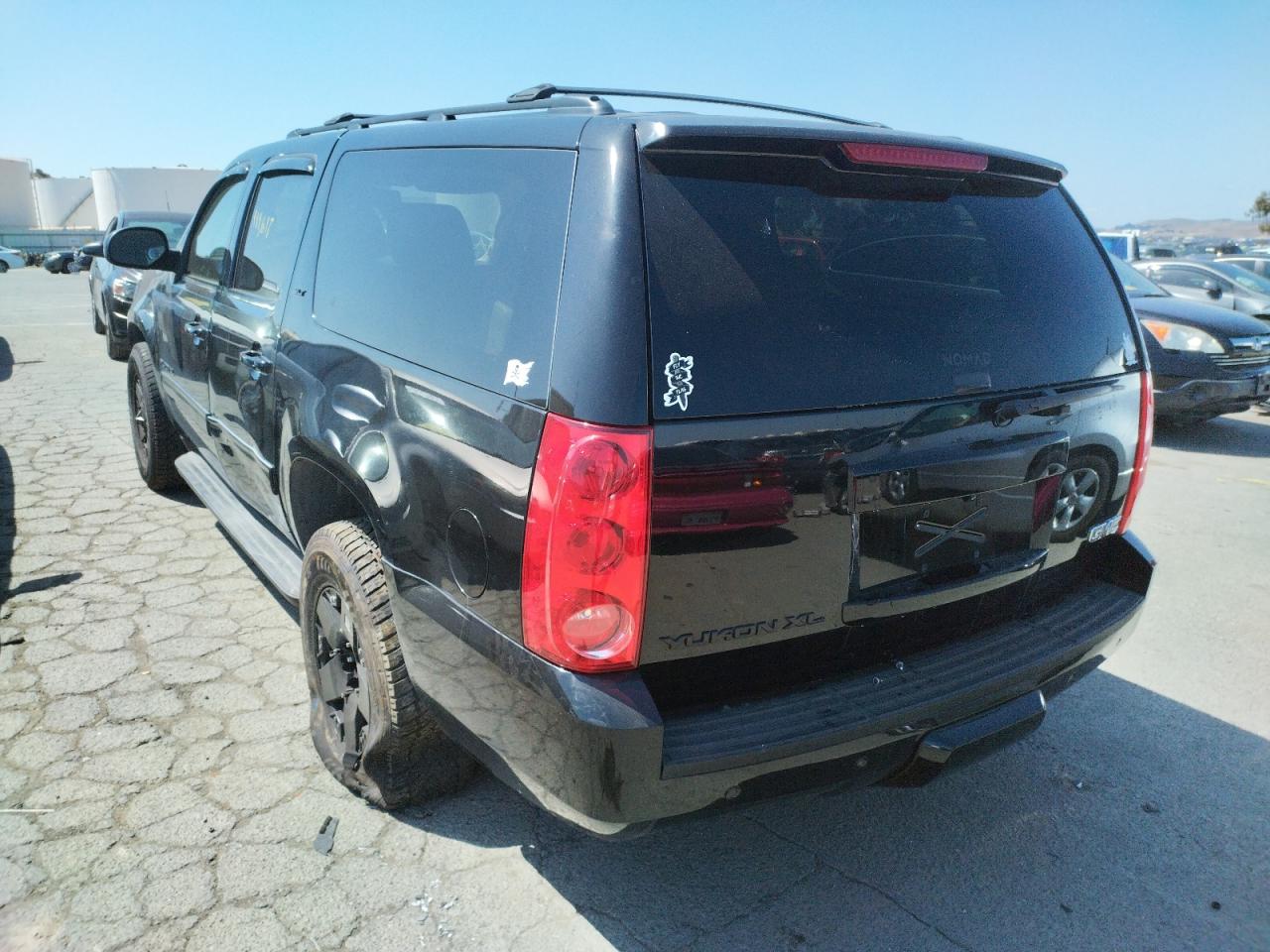 Photo 3 from auction – 2011 GMC YUKON XL K with VIN 1GKS2KE34BR282972