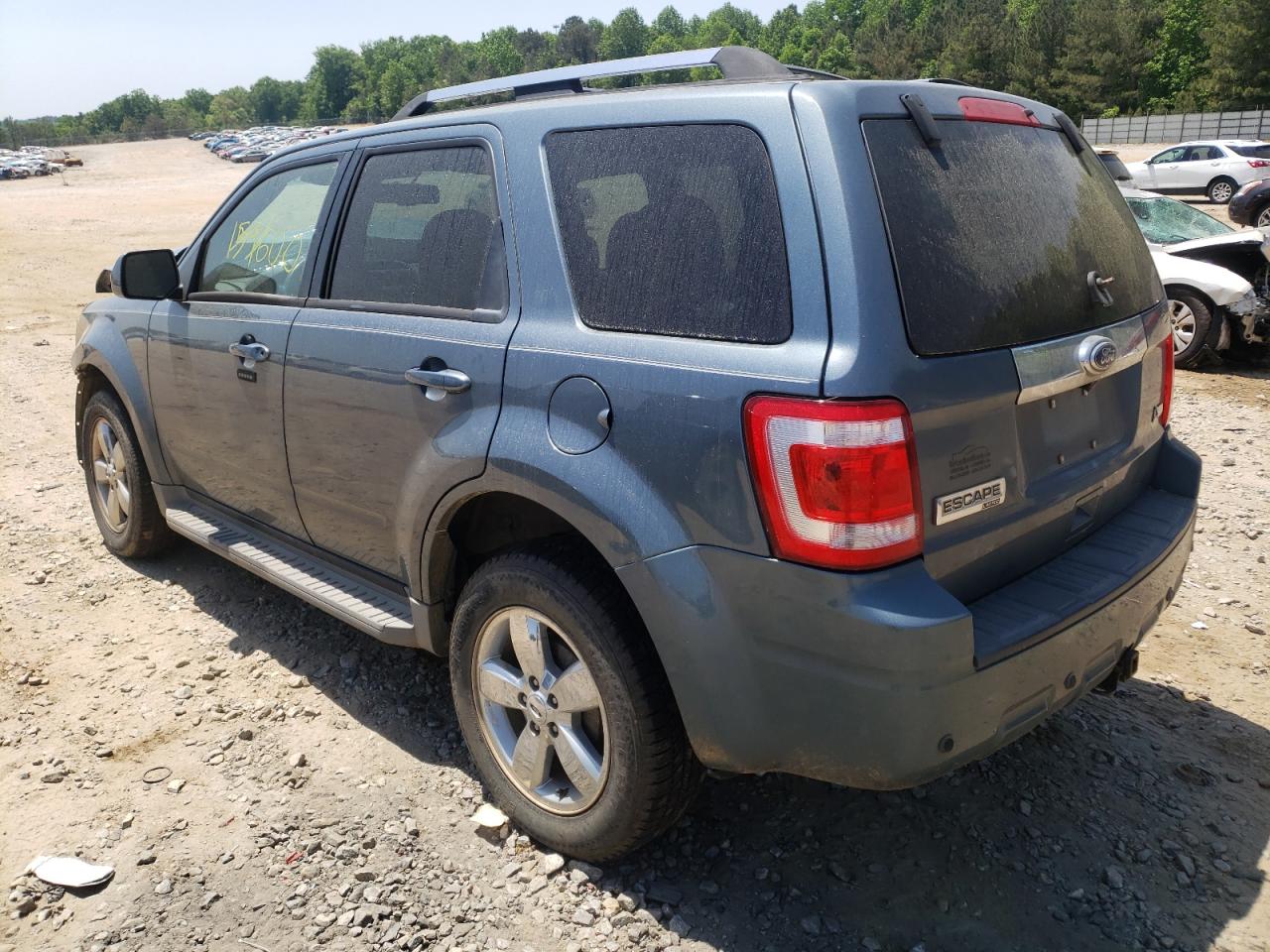 Photo 3 from auction – 2010 FORD ESCAPE LIM with VIN 1FMCU9EG2AKA06637