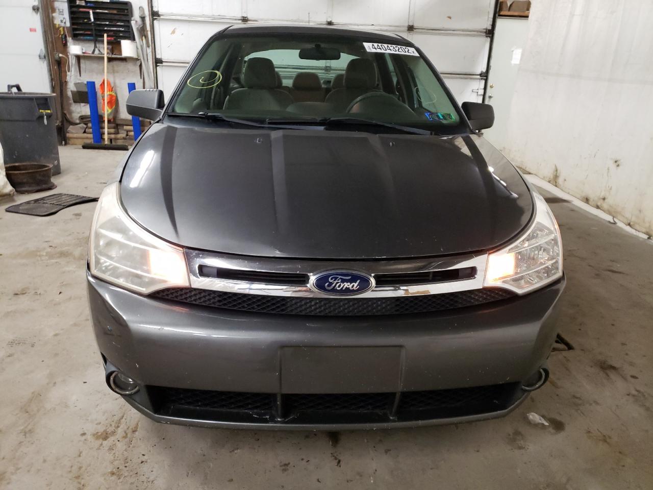Photo 9 from auction – 2011 FORD FOCUS SE with VIN 1FAHP3FN9BW168910