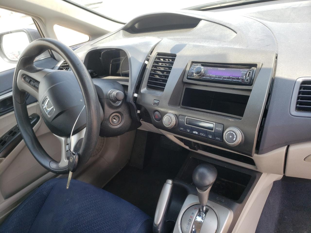 Photo 9 from auction – 2007 HONDA CIVIC HYBR with VIN JHMFA36217S029716