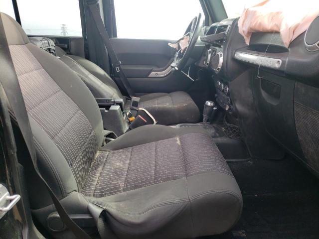 Photo 5 from auction – 2011 JEEP WRANGLER U with VIN 1J4BA5H11BL632291