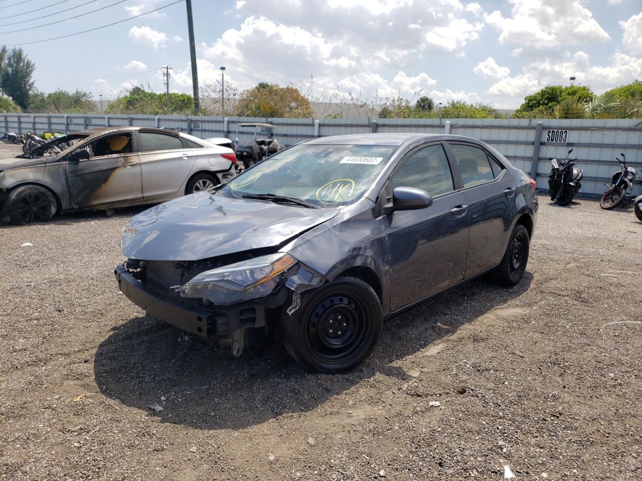 Photo 2 from auction – 2017 TOYOTA COROLLA L with VIN 5YFBURHE1HP584279
