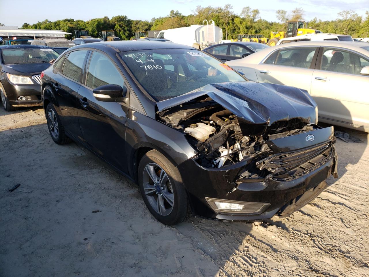 FORD FOCUS SE 2017 with VIN 1FADP3FE4HL337840 - Photo from auction