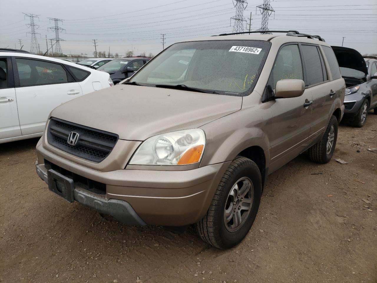 Photo 2 from auction – 2003 HONDA PILOT EX with VIN 2HKYF18473H559972