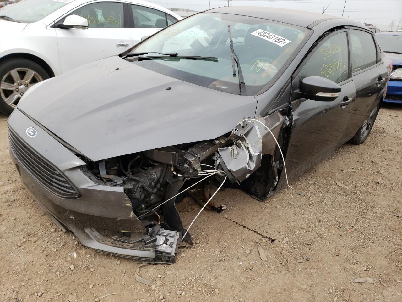 Photo 2 from auction – 2016 FORD FOCUS SE with VIN 1FADP3FE9GL397790