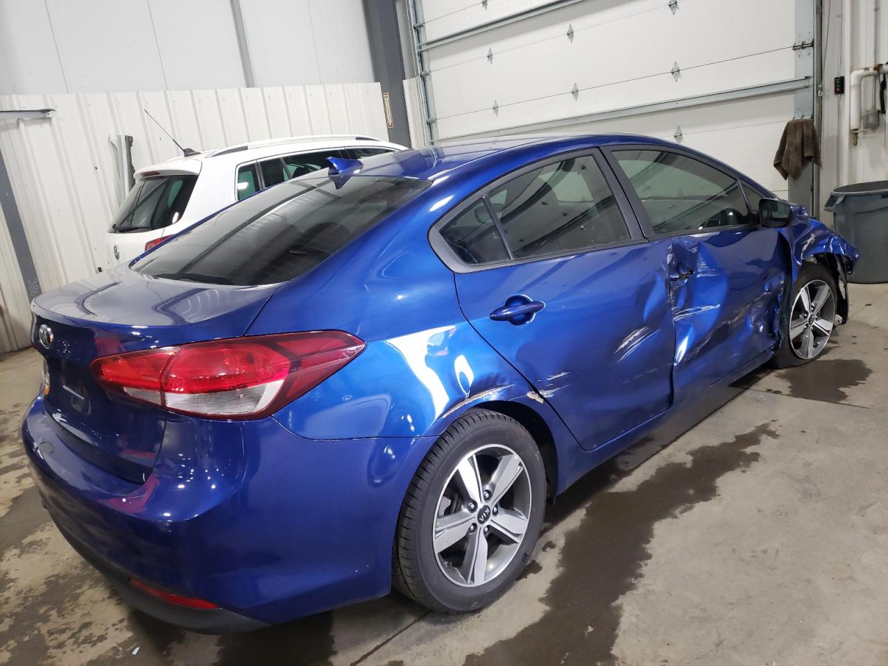 Photo 4 from auction – 2018 KIA FORTE LX with VIN 3KPFL4A79JE273533