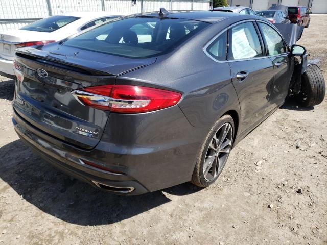 Photo 4 from auction – 2019 FORD FUSION TIT with VIN 3FA6P0D9XKR184743