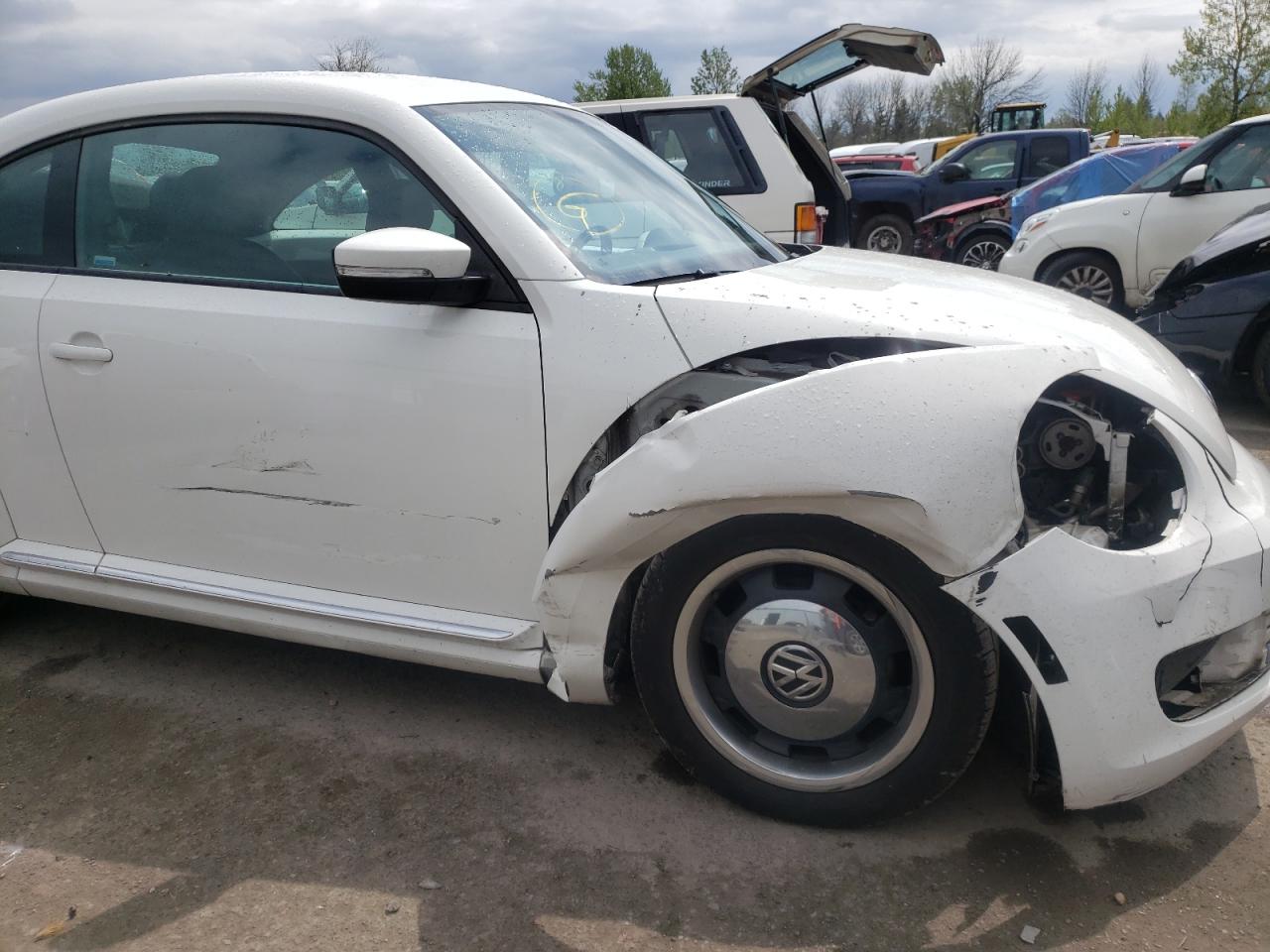 Photo 9 from auction – 2012 VOLKSWAGEN BEETLE with VIN 3VWJP7ATXCM640538