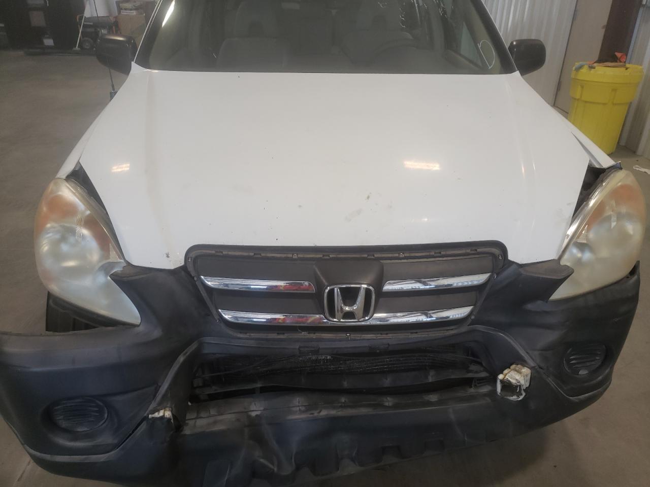 Photo 7 from auction – 2006 HONDA CR-V LX with VIN JHLRD68506C009922