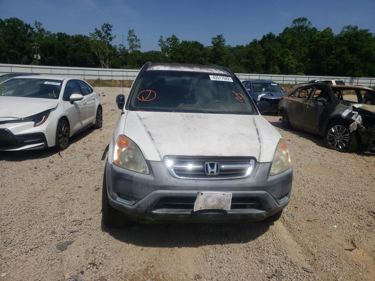 Photo 9 from auction – 2002 HONDA CR-V LX with VIN JHLRD68472C011510