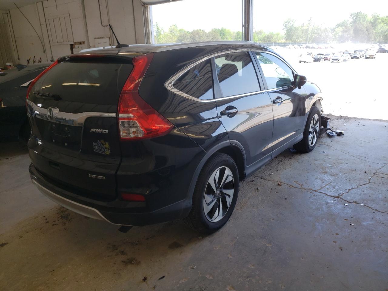 Photo 4 from auction – 2016 HONDA CR-V TOURI with VIN 5J6RM4H95GL046416