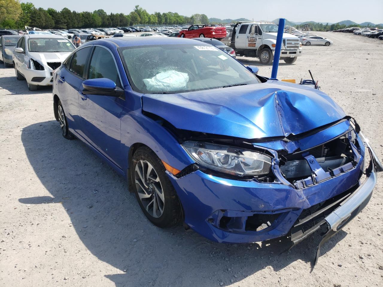 HONDA CIVIC EX 2017 with VIN 19XFC2F78HE074576 - Photo from auction