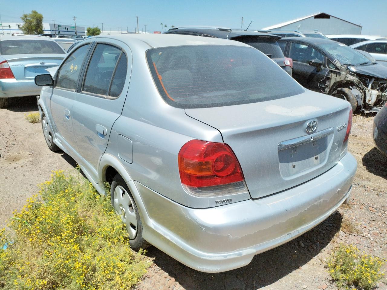 Photo 3 from auction – 2003 TOYOTA ECHO with VIN JTDBT123635036991