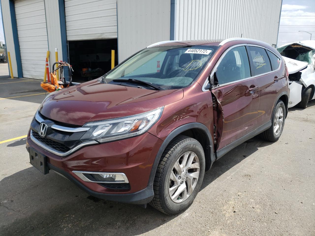 Photo 2 from auction – 2015 HONDA CR-V EXL with VIN 2HKRM4H71FH680071