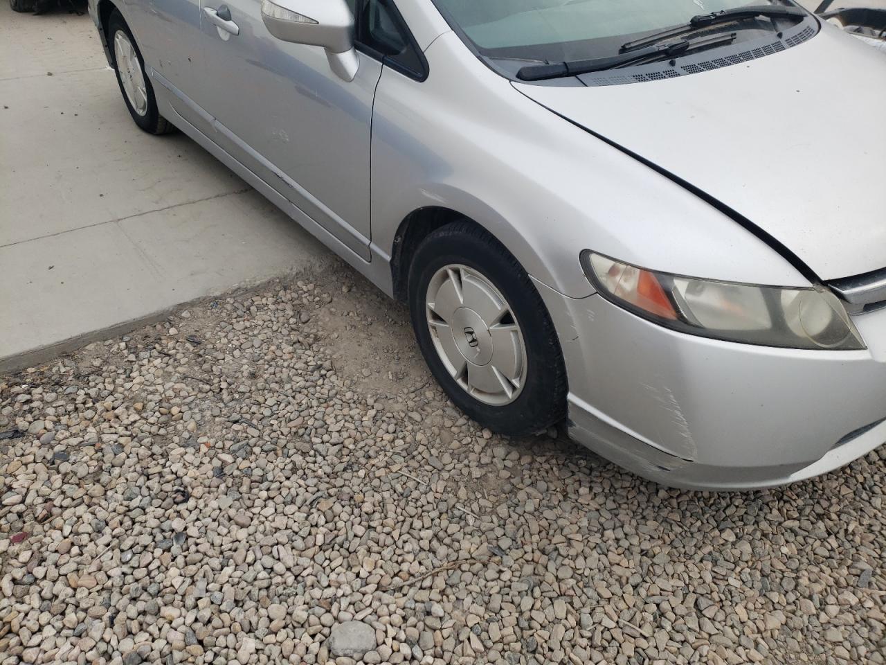 Photo 9 from auction – 2007 HONDA CIVIC HYBR with VIN JHMFA36237S018166
